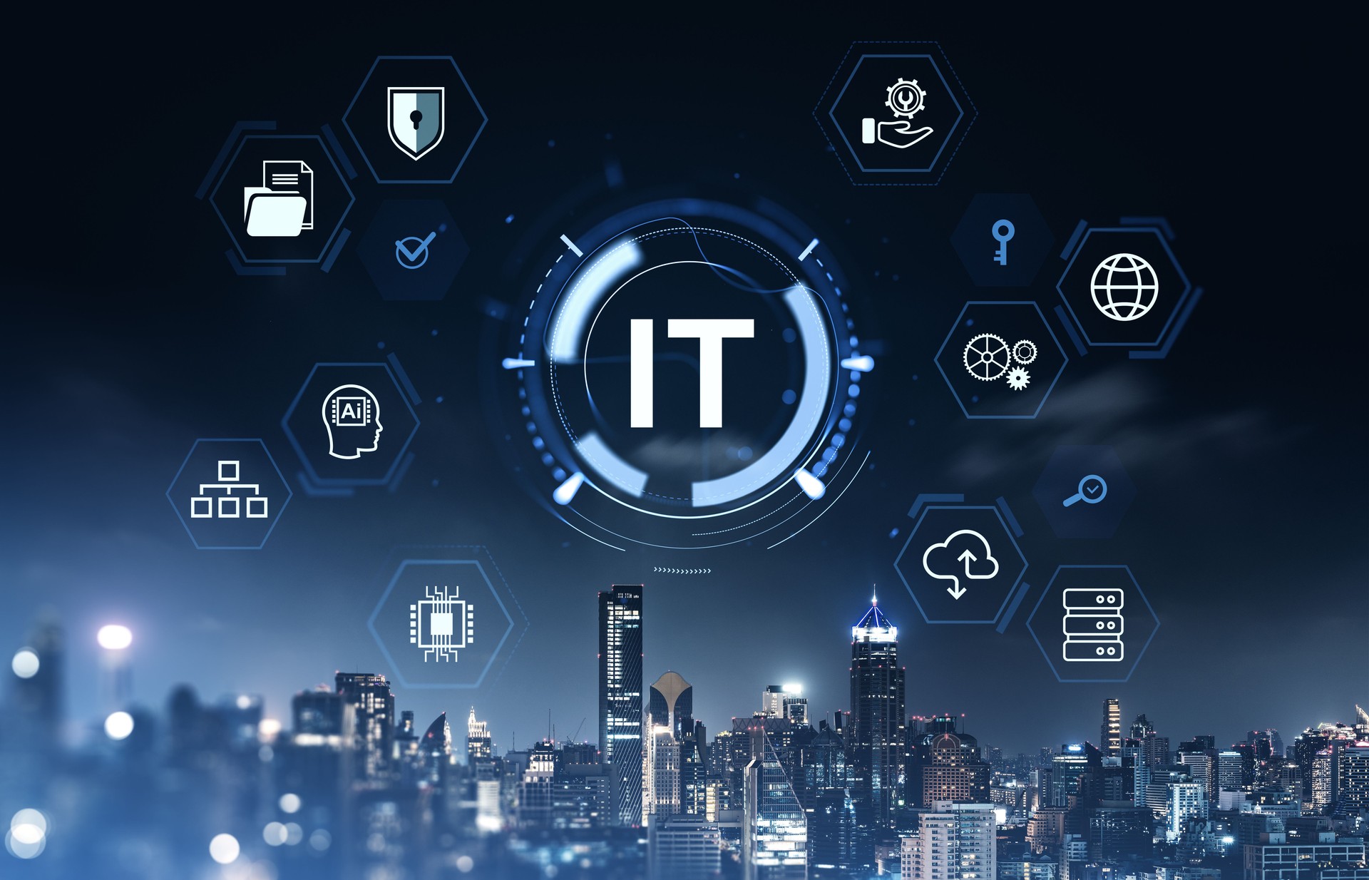IT technology network icons over cityscape at night with digital interface concept.